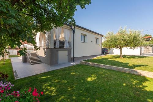Family friendly house with a swimming pool Umag - 27226