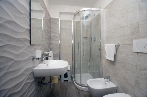 Ванная комната в Hotel Desirèe