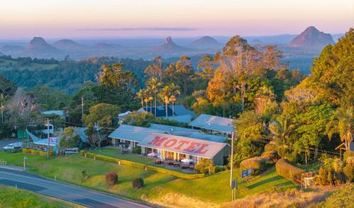 an aerial view of a motel with mountains in the background at Maleny Views Motel in Maleny