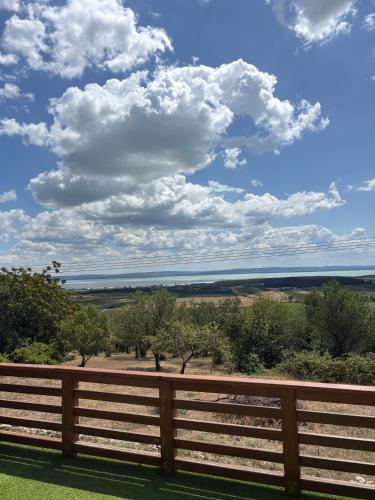 a view of the ocean from a fence at Mona-Lak Balaton Panorama in Zánka