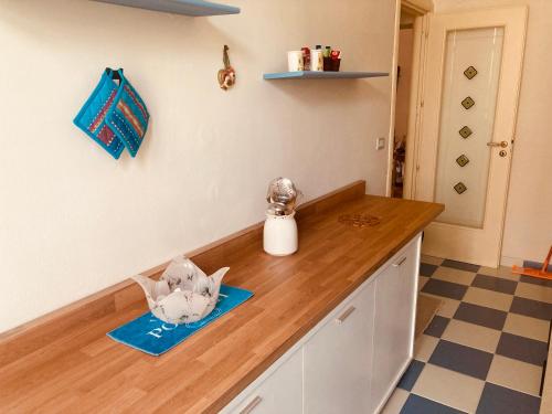 a kitchen with a counter top with a kettle on it at Lungomare Crotone in Crotone
