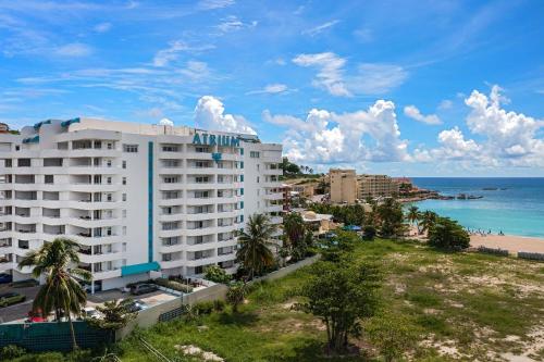 a view of a hotel and the beach at The Atrium Beach Resort and Spa Sint Maarten, Ascend Hotel Collection in Simpson Bay