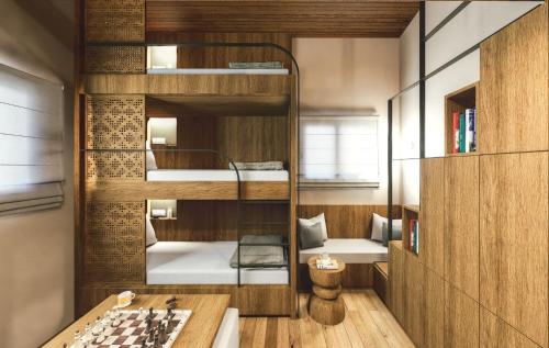 a room with two bunk beds and a chess board at Olympus Refuge D in Litochoro
