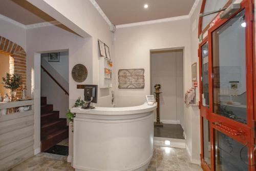 a bathroom with a round sink in a room at Hotel Masaccio in Florence
