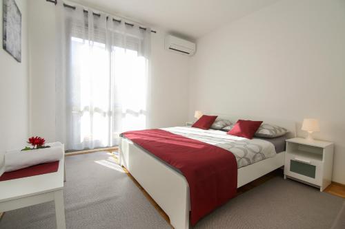 Posteľ alebo postele v izbe v ubytovaní Lavanda Dream Apartment