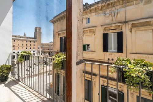 a balcony of a building with plants on it at Biccari 6 Terrace Apartament in Lecce