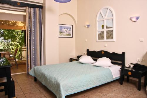 Sun Rise Hotel Apartmentsにあるベッド