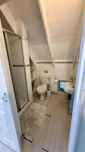 a bathroom with a toilet and a sink at Karlin #2, Frontline, Beach Access, Scottburgh in Freeland Park