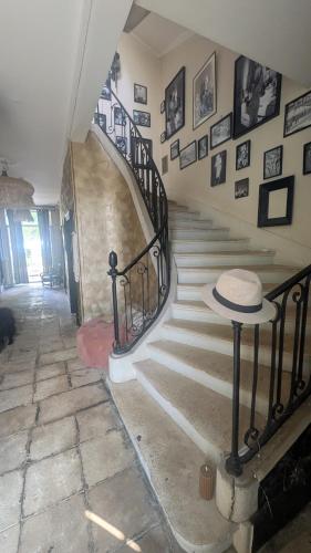 a staircase in a house with a stair case at L'héritage in Champdeniers
