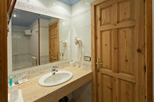 Koupelna v ubytování Hotel La Coma
