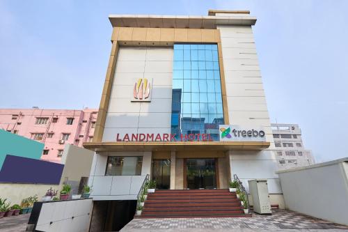 a building with a sign that reads lamarark hotel at Treebo Landmark in Visakhapatnam