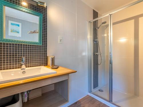 a bathroom with a sink and a shower at Appartement au cœur de La Clusaz, animaux acceptés - FR-1-304-7 in La Clusaz