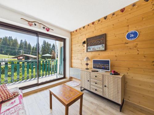 Appartement cosy aux pieds des pistes avec piscine et tennis, proche du centre des Gets