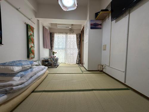 新宿の家-畳み3部屋 Maison à Shinjuku - pedalmi chambre 3 personnes