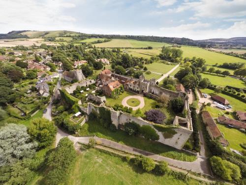 an aerial view of an old castle in the countryside at Amberley Castle- A Relais & Chateaux Hotel in Amberley