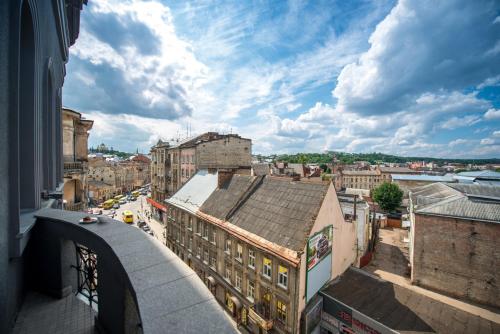 a view of a city from a building at Astoria Hotel in Lviv