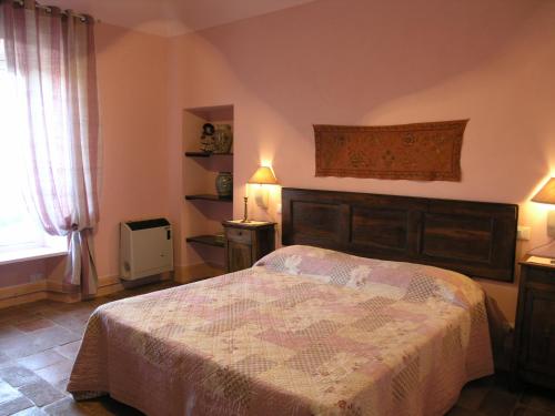 La Cantinetta Resort tesisinde bir odada yatak veya yataklar