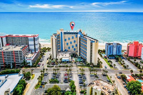 an aerial view of a hotel and the ocean at New ! Ocean Reef Resort-Unique Renovated Oceanfront Condo -Free parking - Amazing pools & Views in Myrtle Beach