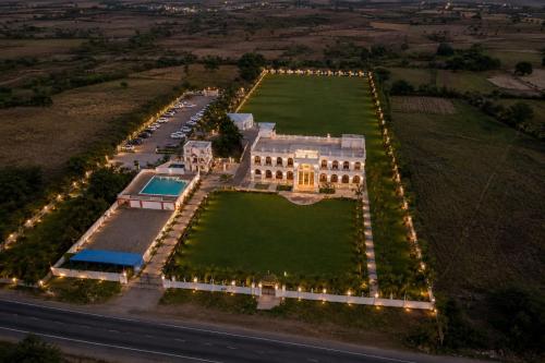 an aerial view of a mansion with a large yard at The Emerald Palace in Sehore