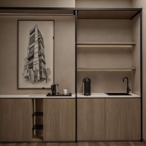 a kitchen with a sink and a picture of a building at Radisson Hotel Jeddah Tahlia in Jeddah