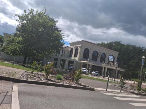 a building on the side of a street at Espace naturel in La Tour-de-Salvagny
