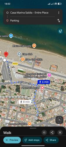 a cell phone screen with a map of a beach at Casa Marina Saïdia in Saïdia