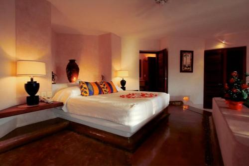 Letto o letti in una camera di Villa Carolina Boutique Hotel ADULTS ONLY