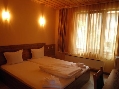 Postel nebo postele na pokoji v ubytování Complex Diana