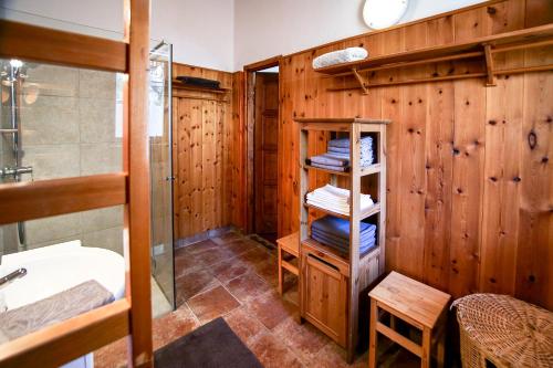 a bathroom with a shower and a sink at Bambuszkert in Kisoroszi