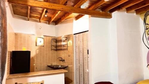 a bathroom with a sink in a room at Wanasa house in Dahab