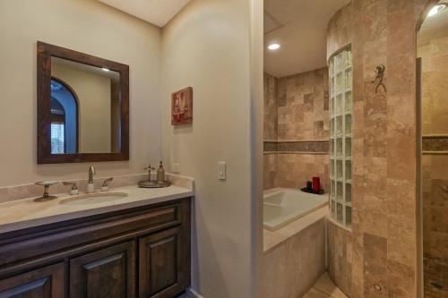 a bathroom with a sink and a shower and a tub at Sandy Beach Rocky Point Bella Sirena 203-E in Puerto Peñasco