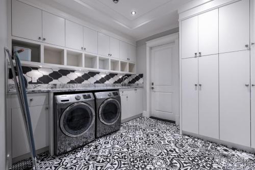 a laundry room with a washer and dryer in it at Private Room in Richmond in Richmond