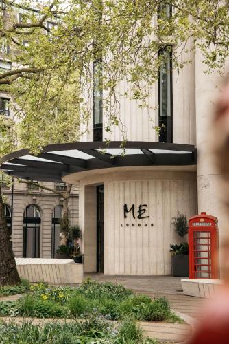 a building with a red phone booth in front of it at ME by Meliá London - Covent Garden in London