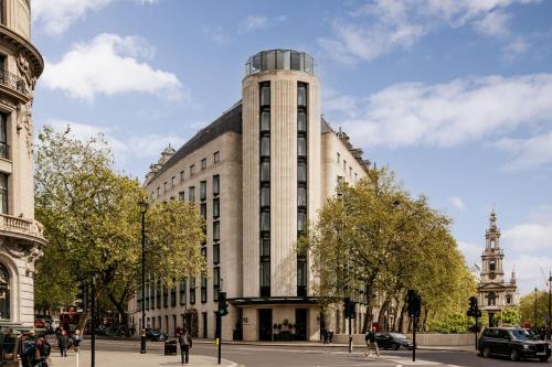 a large building with a tower on top of it at ME by Meliá London - Covent Garden in London