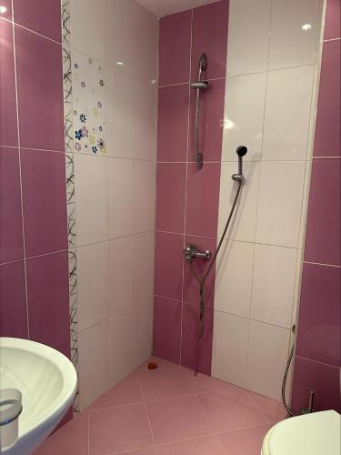 a bathroom with a shower and a sink at стаи за гости Гергана in Tsarevo