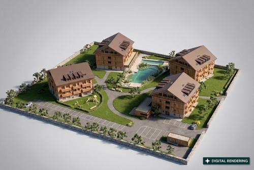 a model of a resort with buildings and a pool at keyone homes Hochficht in Ulrichsberg