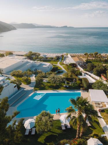an aerial view of the resort and the ocean at Lichnos Beach in Parga