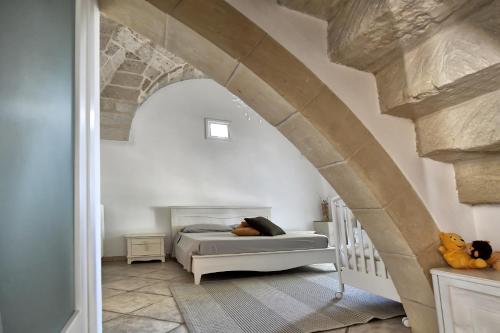 A bed or beds in a room at Villa Panagias tis Loreto