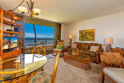 a living room with a couch and a table at SUGAR BEACH RESORT #227 in Kihei