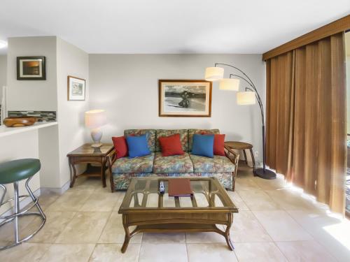 a living room with a couch and a table at SUGAR BEACH RESORT #125 in Kihei