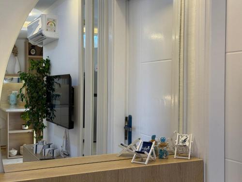 a mirror on a counter in a room at Smart Home near beach and pool in Sharm El Sheikh