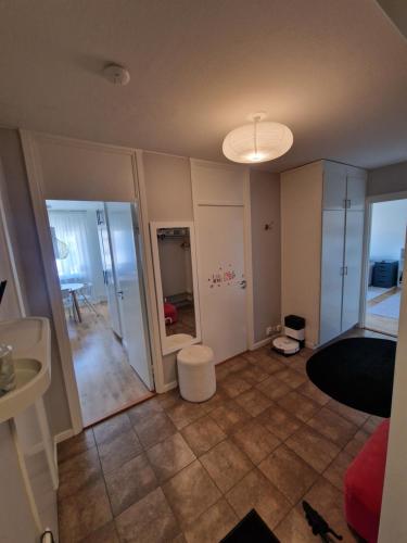 an empty living room with a large room with a room at Central lägenhet i Visby -4 person inkl parkering in VBY