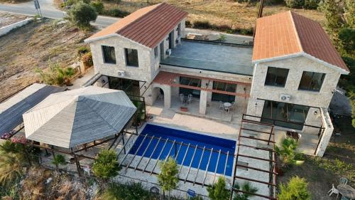an aerial view of a house with a swimming pool at LasaThea in Lasa