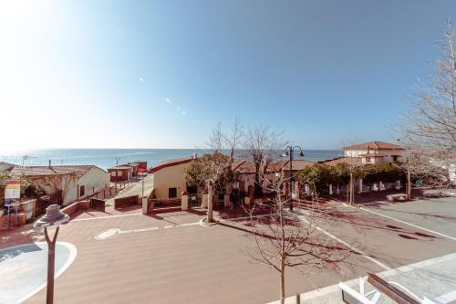 an empty parking lot in front of a building at Le Terrazze in Follonica