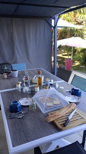 a white table with food on top of it at Chez les catherine in Saintes