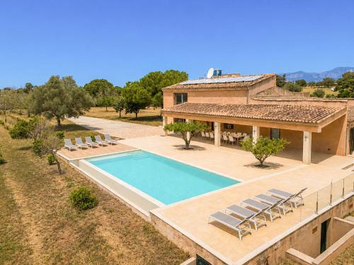 an aerial view of a house with a swimming pool at Holiday Home Can Toni by Interhome in Inca