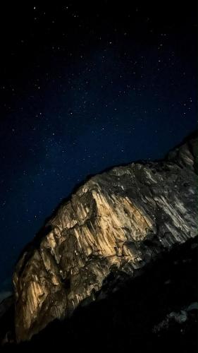 a rock under a starry sky at night at Komarnica Forest Owl 2 in Šavnik