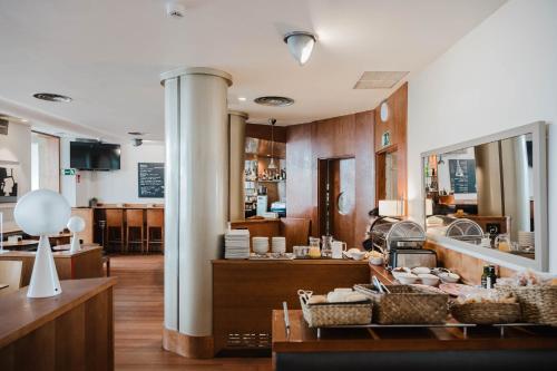 a kitchen with a table with baskets of food at Hotel Niza in San Sebastián