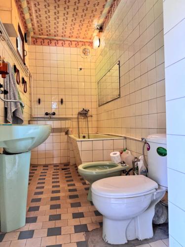 a bathroom with a toilet and a sink at Kolagis Marani in Kolagi