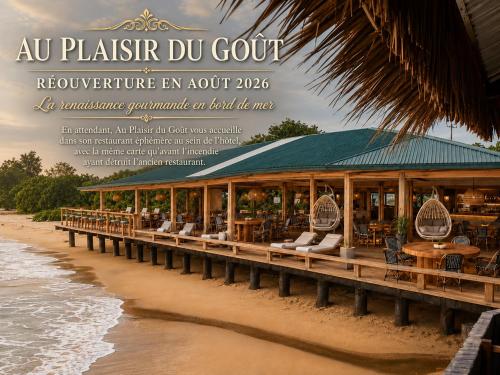 a magazine advertisement for a restaurant on the beach at Les Gites de Kribi in Kribi